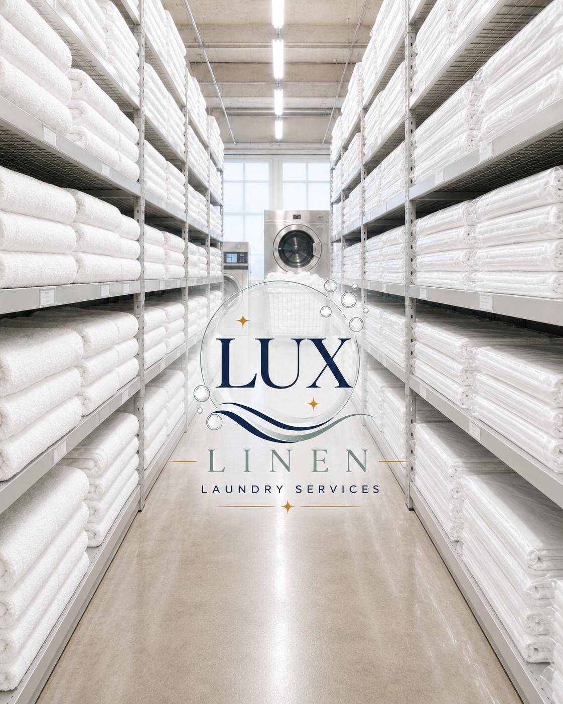 Lux Linen luxury laundry facility with pristine folded towels